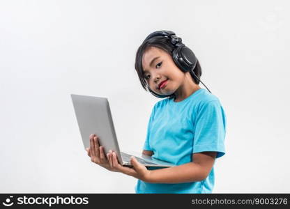 Little girl using laptop computer and listening lesson online 