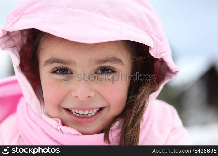 little girl wearing winter clothes