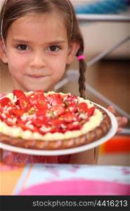 Little girl with a tart