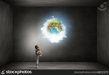 Little girl with bear. Cute girl wearing pajamas with toy bear in hand. Elements of this image are furnished by NASA