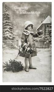 Little girl with christmas tree, gifts and vintage toys. Antique picture with original film grain and scratches