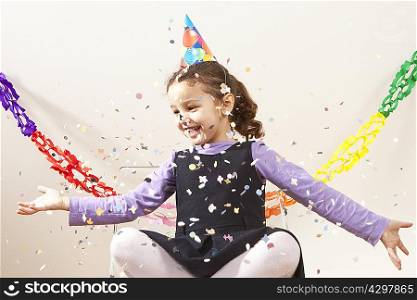 Little girl with confetti