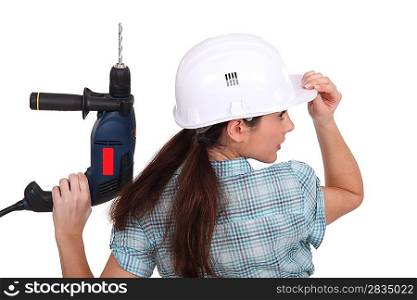 Little girl with drill