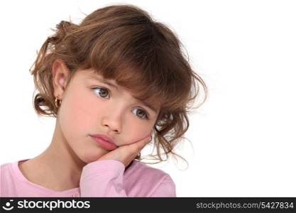 Little girl with expression of sadness
