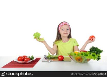 little girl with fresh vegetables. Isolated on white background