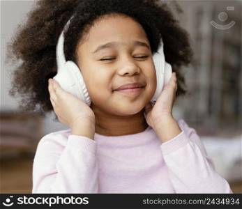 little girl with headphones 2