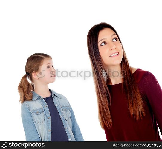 Little girl with her mother looking up isolated on a white background