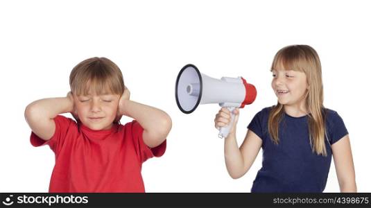 Little girl with megaphone shouting to her twin sister isolated on white background