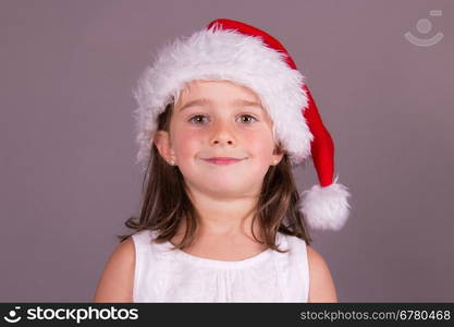 Little girl with Santa hat