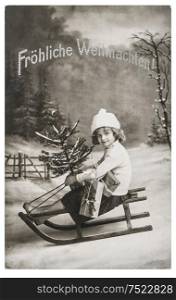 Little girl with sled and Christmas tree. Nostalgic vintage picture with original film grain and scratches
