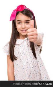 Little girl with summer clothes doing thumbs up