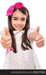 Little girl with summer clothes doing thumbs up