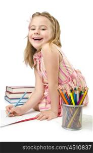 Little girl writing with pencils