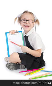 Little girl writing with pencils