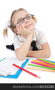 Little girl writing with pencils