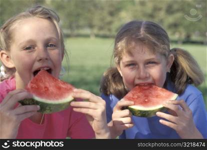 Little Girls Eating Watermelon