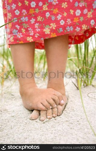 Little Girls Feet in the Sand