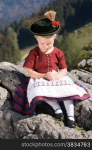 Little girls in Bavarian pray