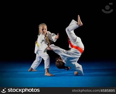 Little girls martial arts fighters isolated