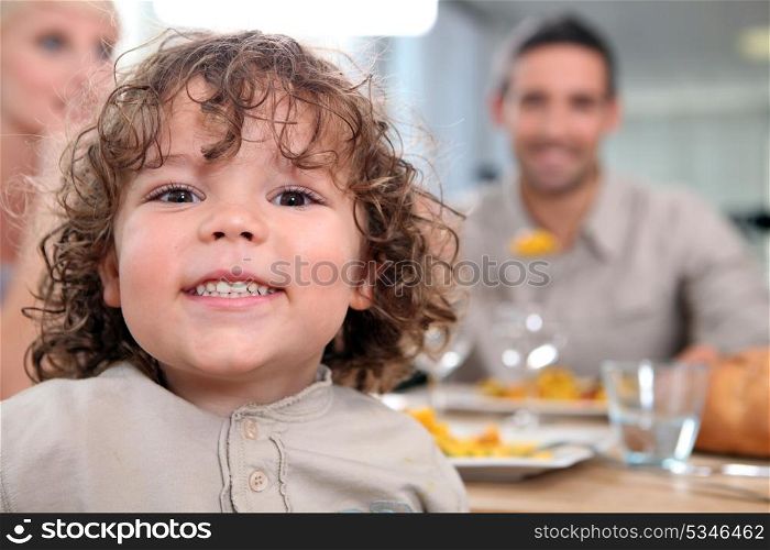 Little kid at kitchen table