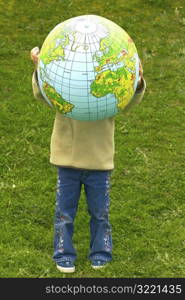 Little Kid Holding a Globe