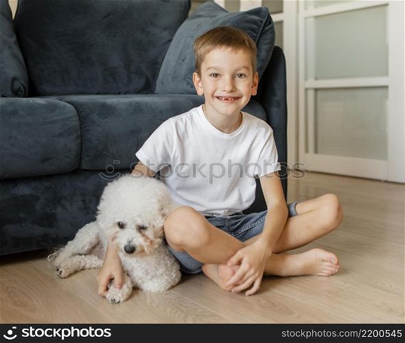 little kid posing with his dog