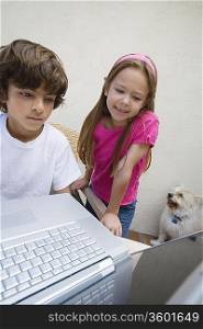 Little Kids Using a Laptop