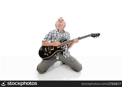 Little musician playing guitar. Isolated on a white background