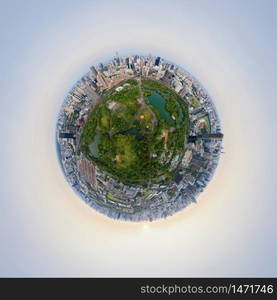 Little planet 360 degree sphere. Panorama of aerial of green trees in Lumpini Park, Sathorn, Bangkok Downtown Skyline. Thailand. Financial district in urban city. Skyscraper buildings at sunset.