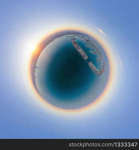 Little planet 360 degree sphere. Panorama of aerial view of The Palm Jumeirah Island, Dubai Downtown skyline, UAE. Financial district and business area in urban city. Skyscraper buildings.