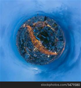 Little planet 360 degree sphere. Panorama of aerial view of Victory Monument on street road in Bangkok Downtown Skyline. Thailand. Financial district in urban city. Skyscraper buildings at night.