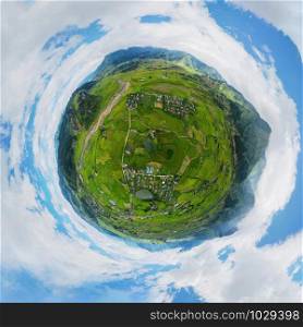 Little planet 360 degree sphere. Panorama of Fansipan mountain with paddy rice terraces, green agricultural fields in rural area, hills valley, Vietnam. Nature landscape background.