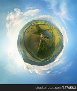 Little planet panorama photo of lake and valley hills. Nature composition.