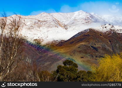 little rainbow in wanaka town mountain