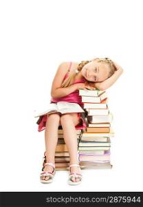 Little schoolgirl sitting on a stack of books
