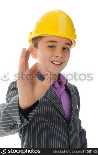 Little smiling builder in helmet. Isolated on a white background