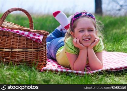 Little smiling girl at picnic
