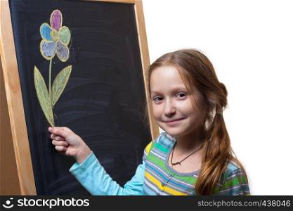 little smiling girl holding a flower that drawn with chalk on a blackboard
