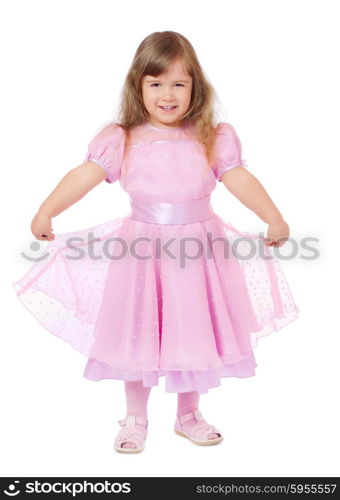 Little smiling girl in pink dress isolated