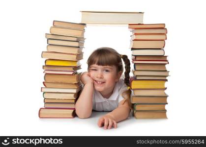 Little smiling girl with books isolated