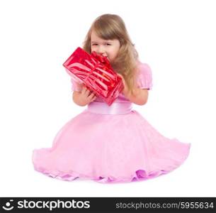 Little smiling girl with gift box isolated