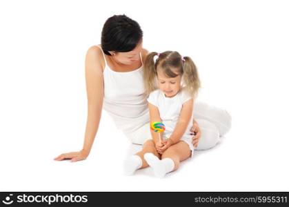 Little smiling girl with mother isolated