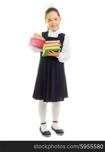 Little smiling schoolgirl with books isolated