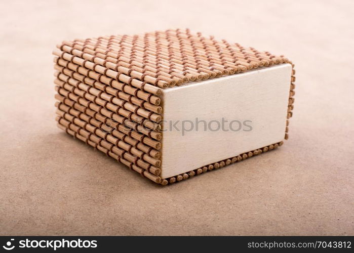 Little Straw wooden box of light brown color