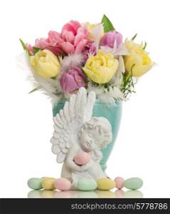 little white guardian angel with colored easter eggs and tulip flowers over white background