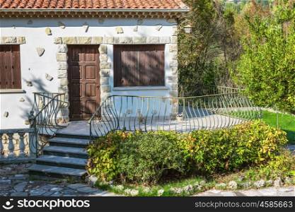 Little white house with a slate roof in Provence, France