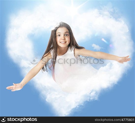 Little woman flying through a heartshaped cloud