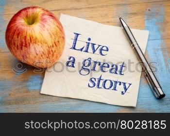 Live a great story - handwriting on a napkin with a fresh apple