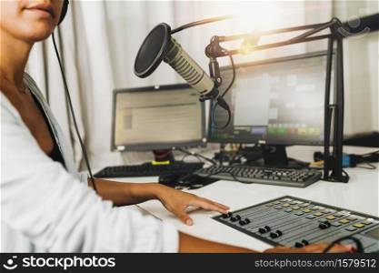 Live broadcasting of a podcast or online radio talk show from a studio. Live broadcasting of a podcast or online radio talk show