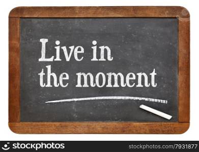 Live in the moment i- inspirational advice on a vintage slate blackboard